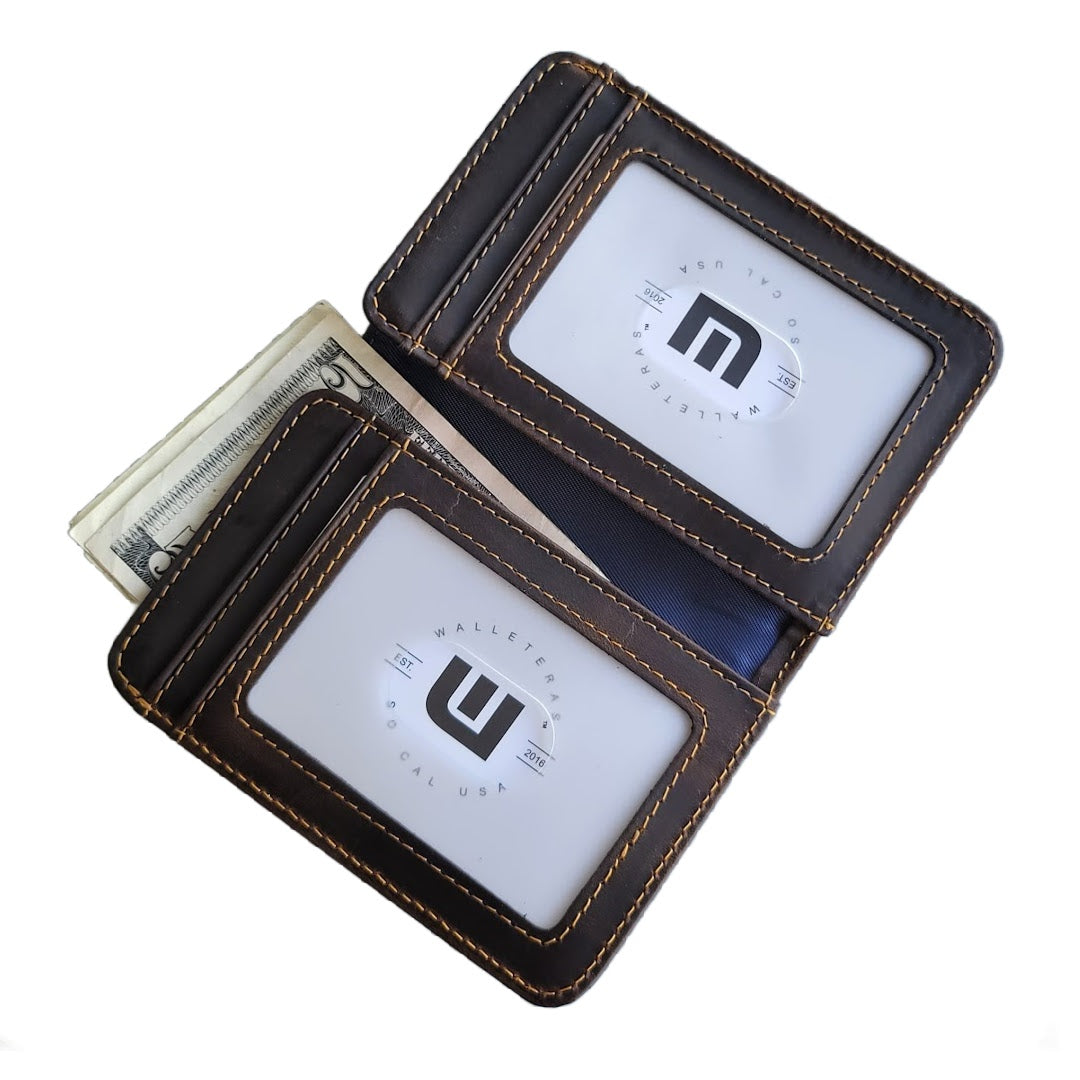 Dual ID leather wallet with cash coming out of a pocket.
